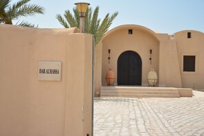 Welcome to Dar Almassa, where a grand entrance sets the tone for a memorable stay.