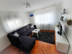 Departamento, 1 cama Queen size y sofá cama | Sala de estar