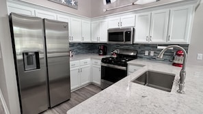 House, Multiple Beds, Lanai, Golf View | Private kitchen | Fridge, microwave, oven, stovetop