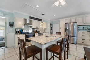 Fridge, microwave, oven, stovetop - TIKI BLUE Beach House:Heated Pool+Hot Tub+Tiki Bar (Cocoa Beach)