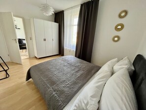 2 bedrooms, desk, iron/ironing board, travel cot
