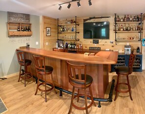 Enjoy a drink at the bar, where you can socialize with friends and family.