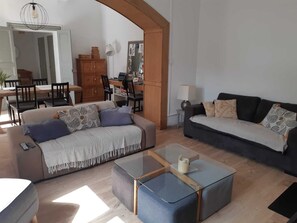 TV, fireplace, books, printers