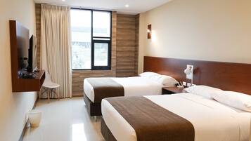 Premium bedding, down duvets, in-room safe, desk