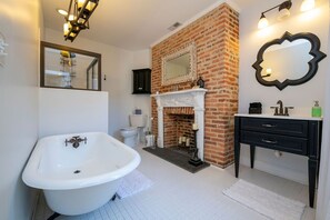 Combined shower/tub, hair dryer, towels, soap