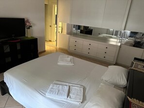 1 bedroom, desk, iron/ironing board, bed sheets
