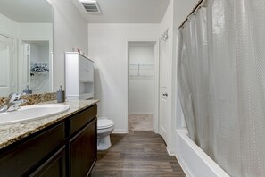 Combined shower/tub, hair dryer, towels, soap