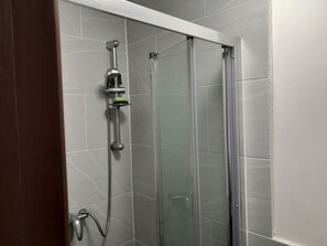 Apartment | Bathroom | Shower, towels - Captivating 4-bed Apartment (Ndeje)