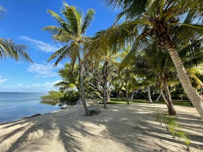 On the beach, sun loungers, beach towels