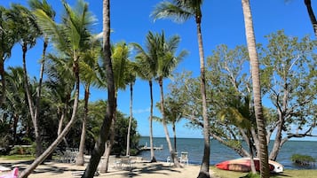 On the beach, sun-loungers, beach towels