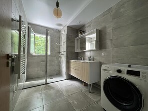 Shower, hair dryer, towels, soap