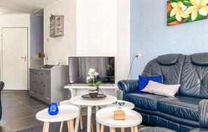 Una Smart TV, una chimenea