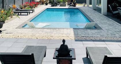 Intimate Heated Pool Side Beach Bungalow! Just steps to the beach!