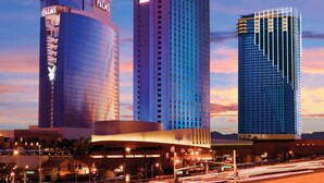Three high-rise buildings with the 'Palms' sign, indicating a hotel complex.