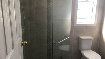 Shower, towels, soap, shampoo