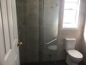 Shower, towels, soap, shampoo