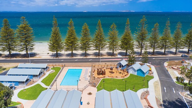 A coastal resort with a swimming pool, beach access, and a view of the ocean. - RAC Esperance Holiday Park (Castletown)