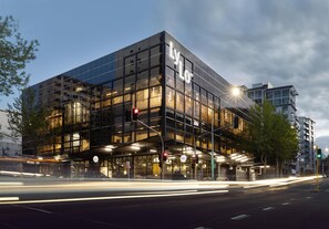 A modern building with a glass facade and the name "Lylo" on the side. - LyLo Auckland (Auckland)