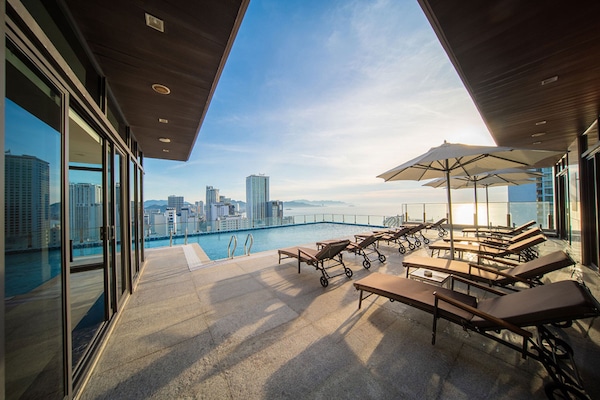 Outdoor pool, open 7:00 AM to 8:00 PM, pool umbrellas, pool loungers