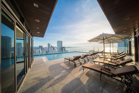 Outdoor pool, open 7:00 AM to 8:00 PM, pool umbrellas, sun loungers