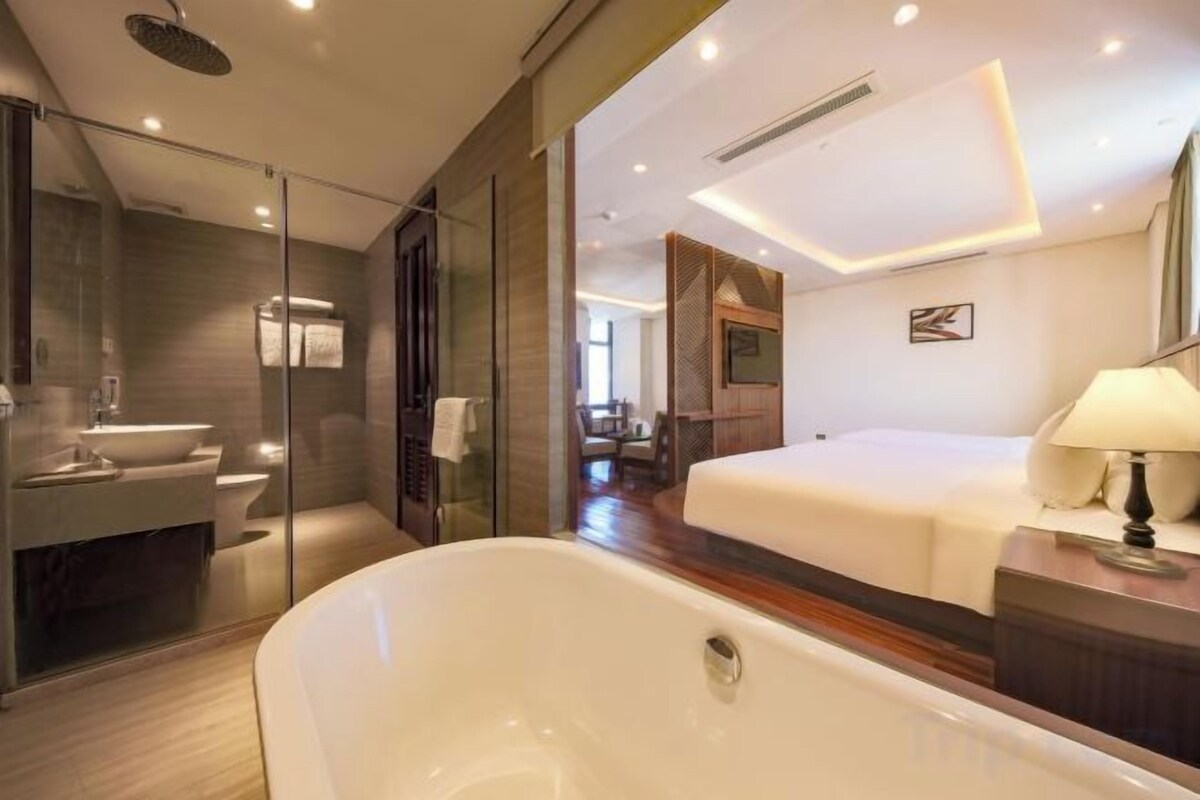 Luxe beddengoed, een minibar, een kluis op de kamer, een bureau