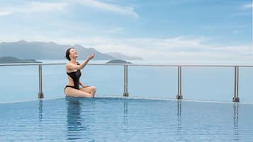 Outdoor pool, open 7:00 AM to 8:00 PM, pool umbrellas, pool loungers