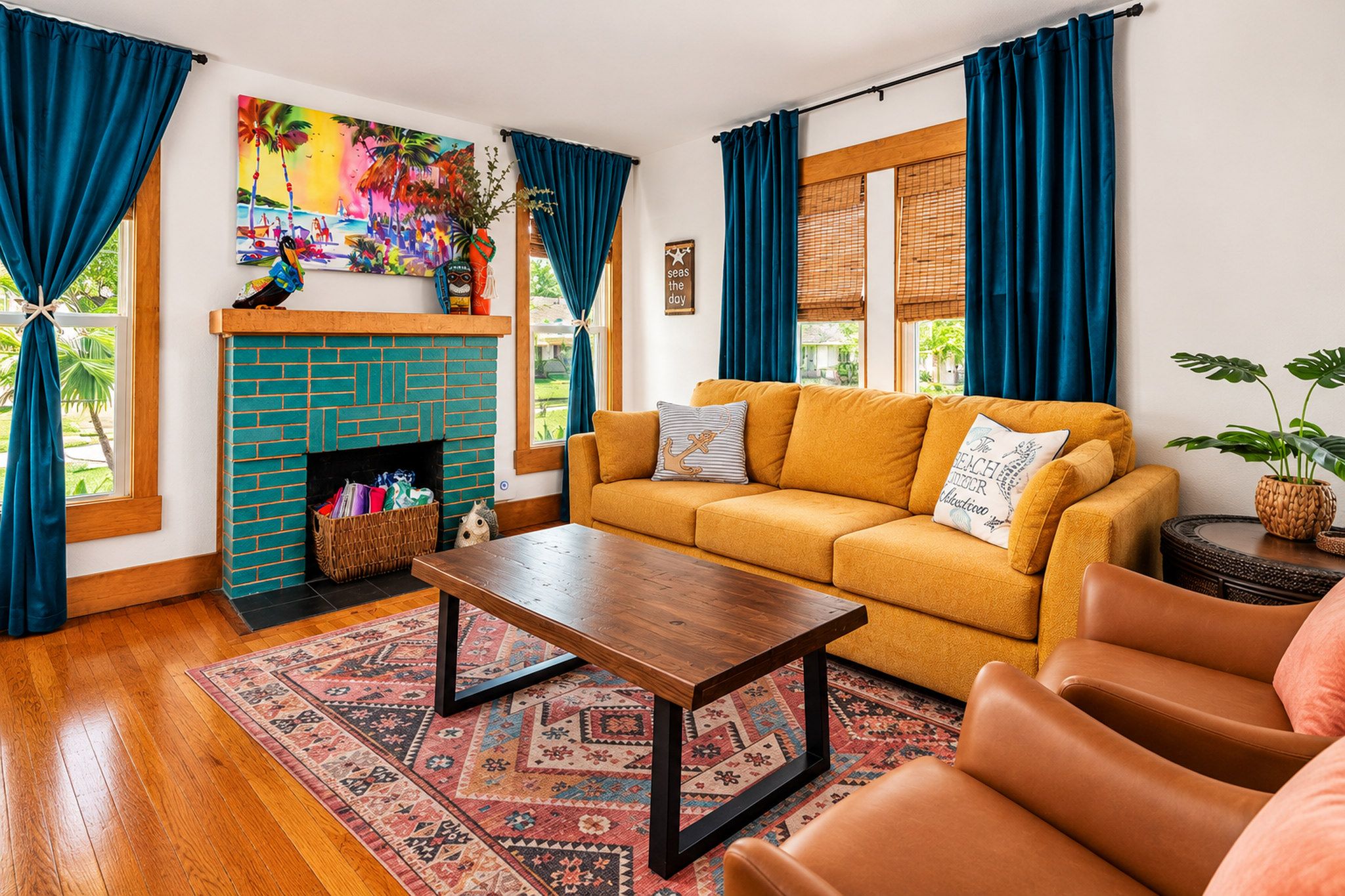 A living room with a fireplace, a sofa, a coffee table, and a patterned rug.