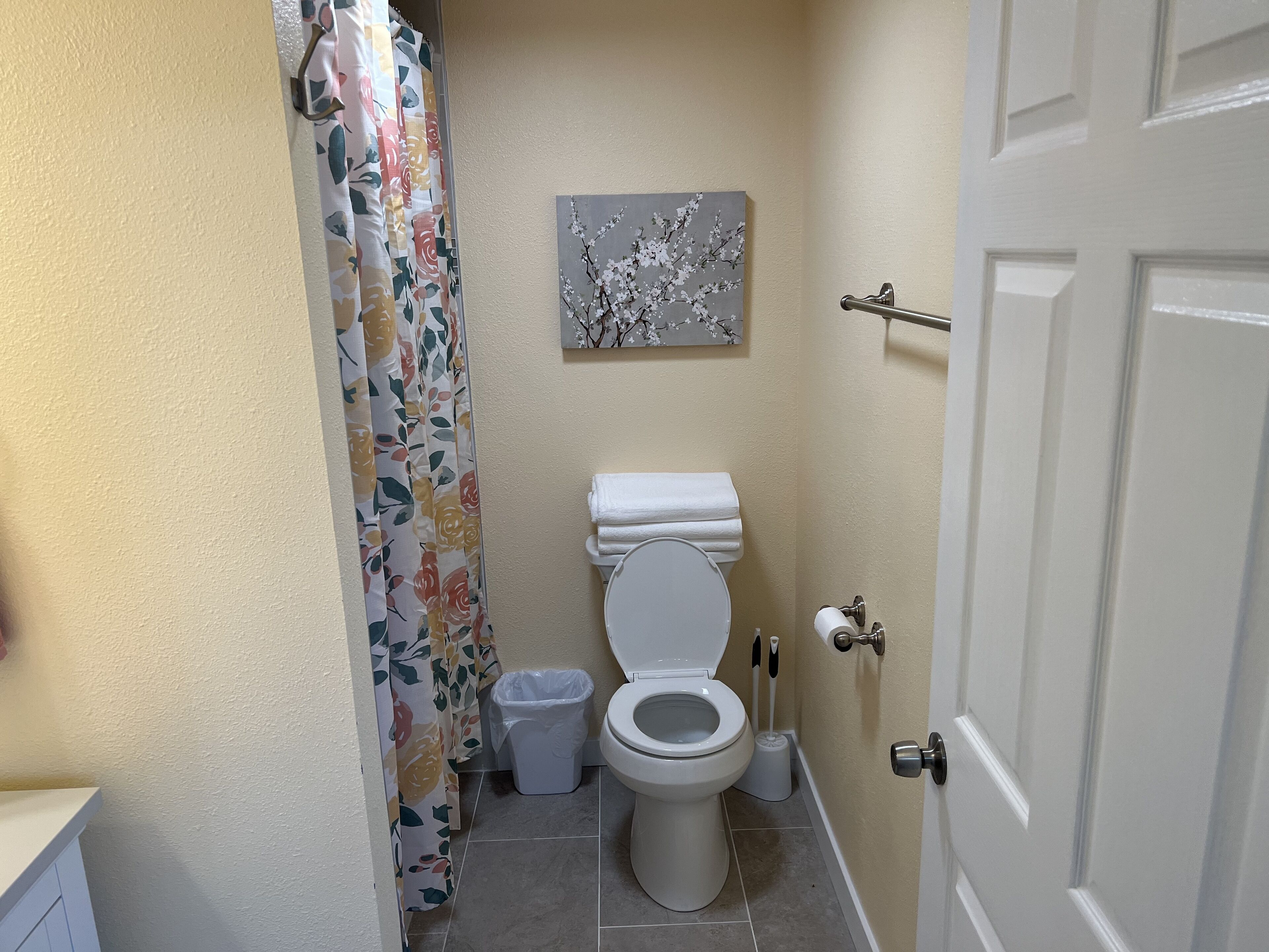 Combined shower/tub, hair dryer, towels, soap