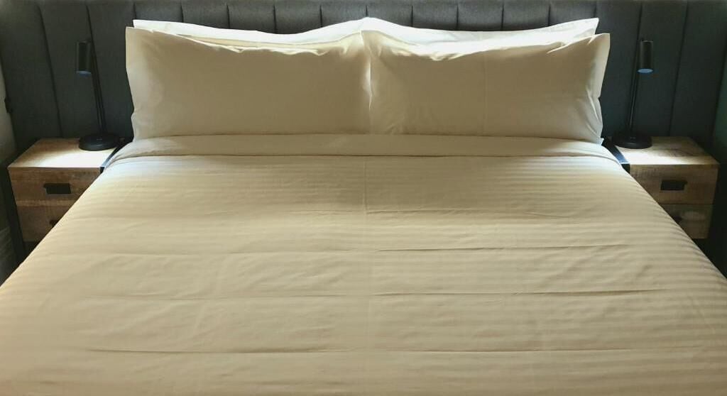 Deluxe-studio, tupakointi kielletty, näköala puutarhaan | Ylelliset vuodevaatteet, memory foam -patjalliset sängyt