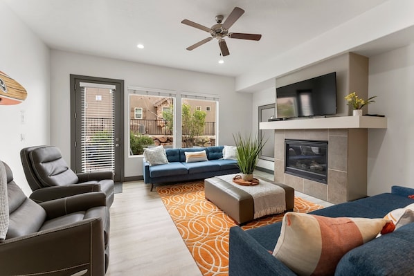 Townhome, 4 Bedrooms | Living area | 36-inch Smart TV with digital channels, TV, streaming services