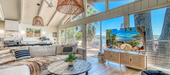 Luxurious lakefront with views, deck, spa & your private dock