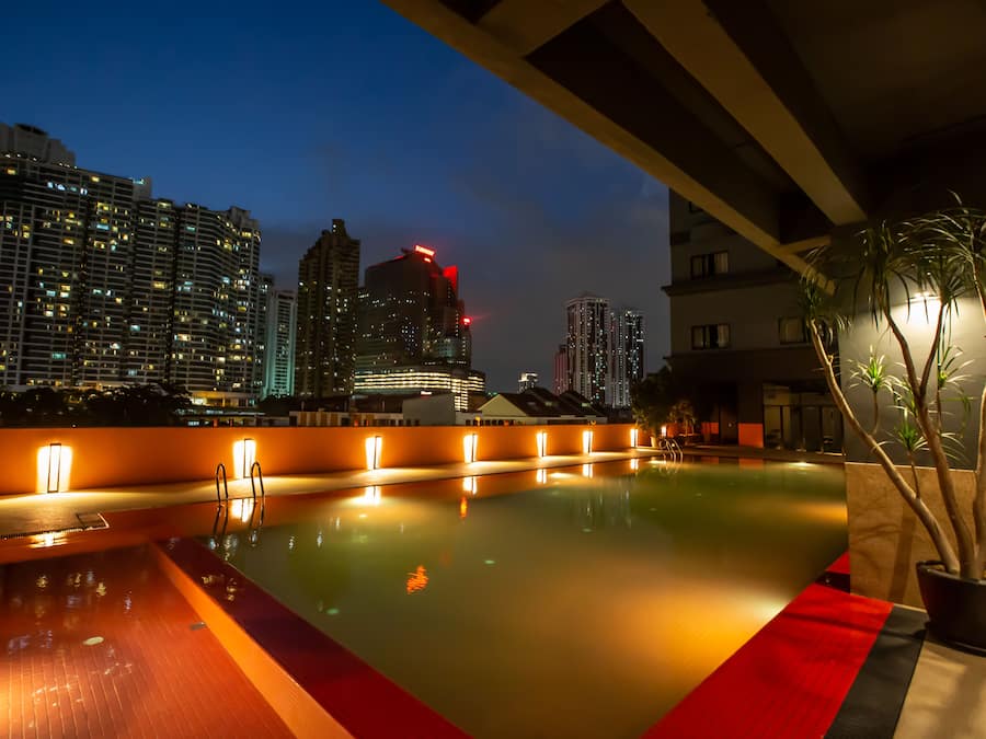 Outdoor pool, open 7:00 AM to 8:00 PM, pool loungers