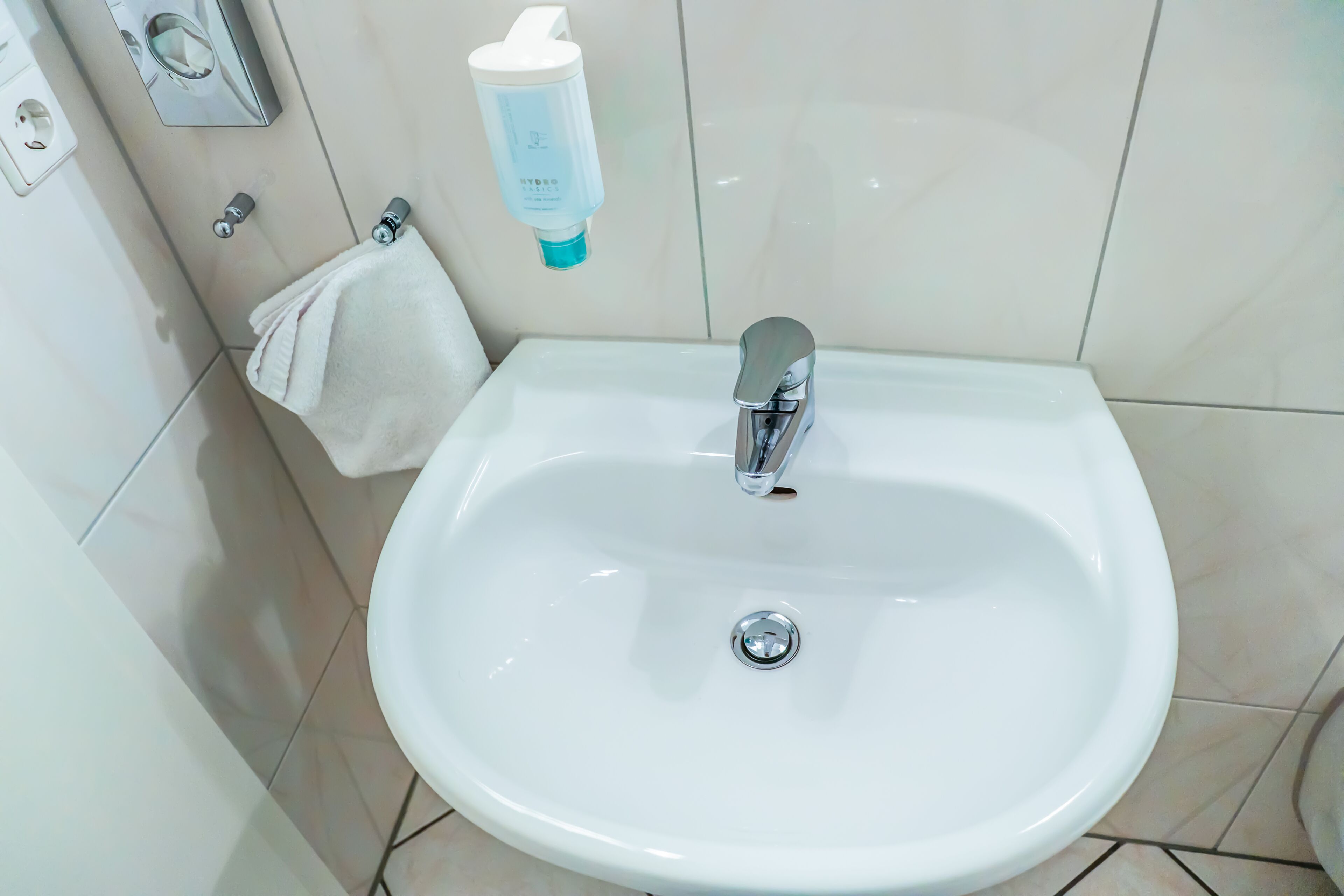 separate bathtub and shower, hair dryer, towels, soap