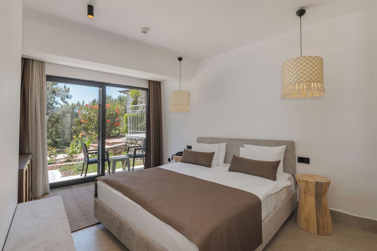 Family Quadruple Room, Garden View | Premium bedding, minibar, in-room safe, free WiFi