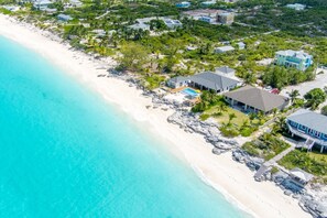 On the beach, sun loungers, beach towels