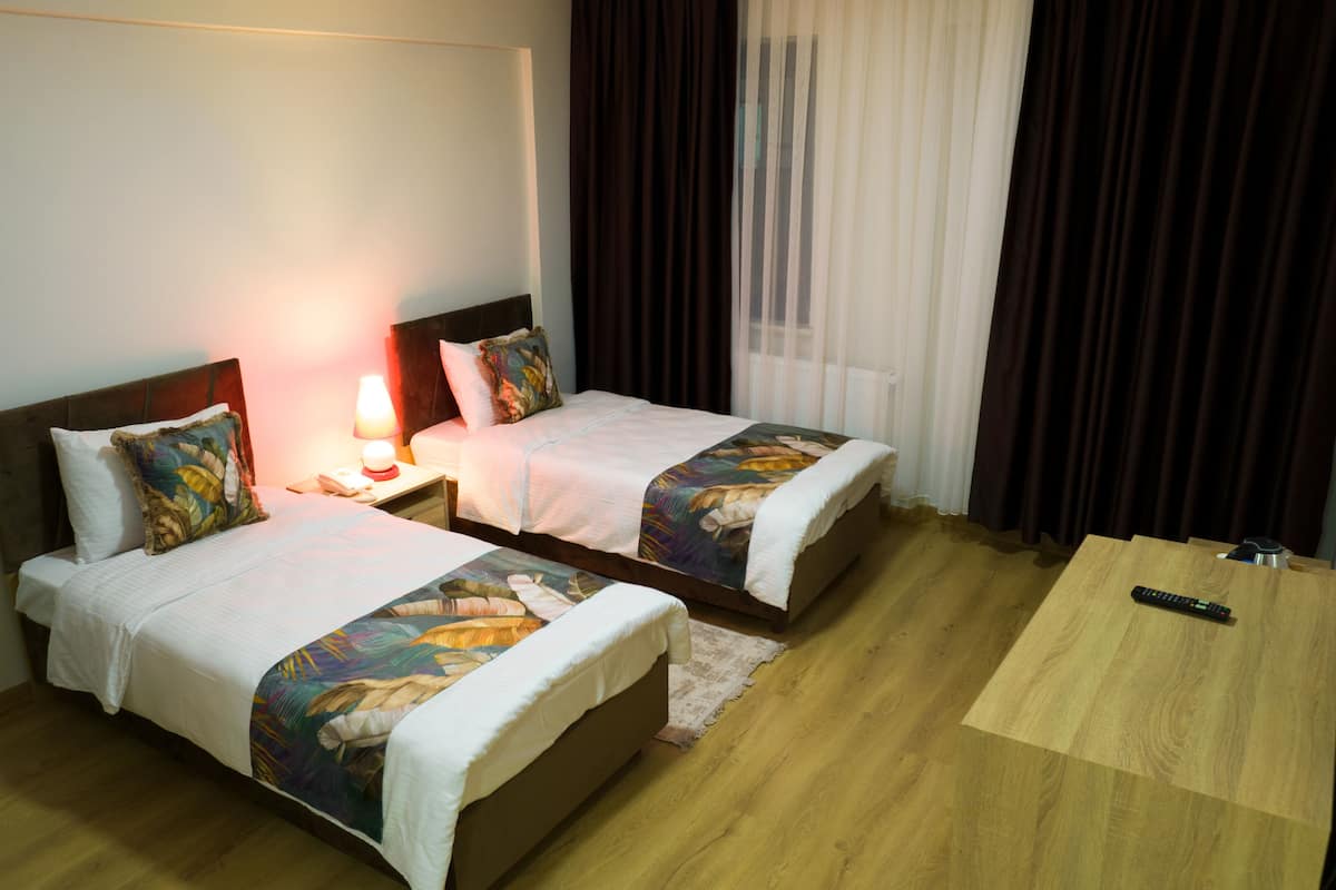 Deluxe Room | Premium bedding, free minibar items, laptop workspace, bed sheets