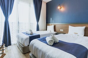 Habitación clásica con 2 camas individuales, 2 camas individuales | Sábanas italianas Frette, ropa de cama de alta calidad y edredón 