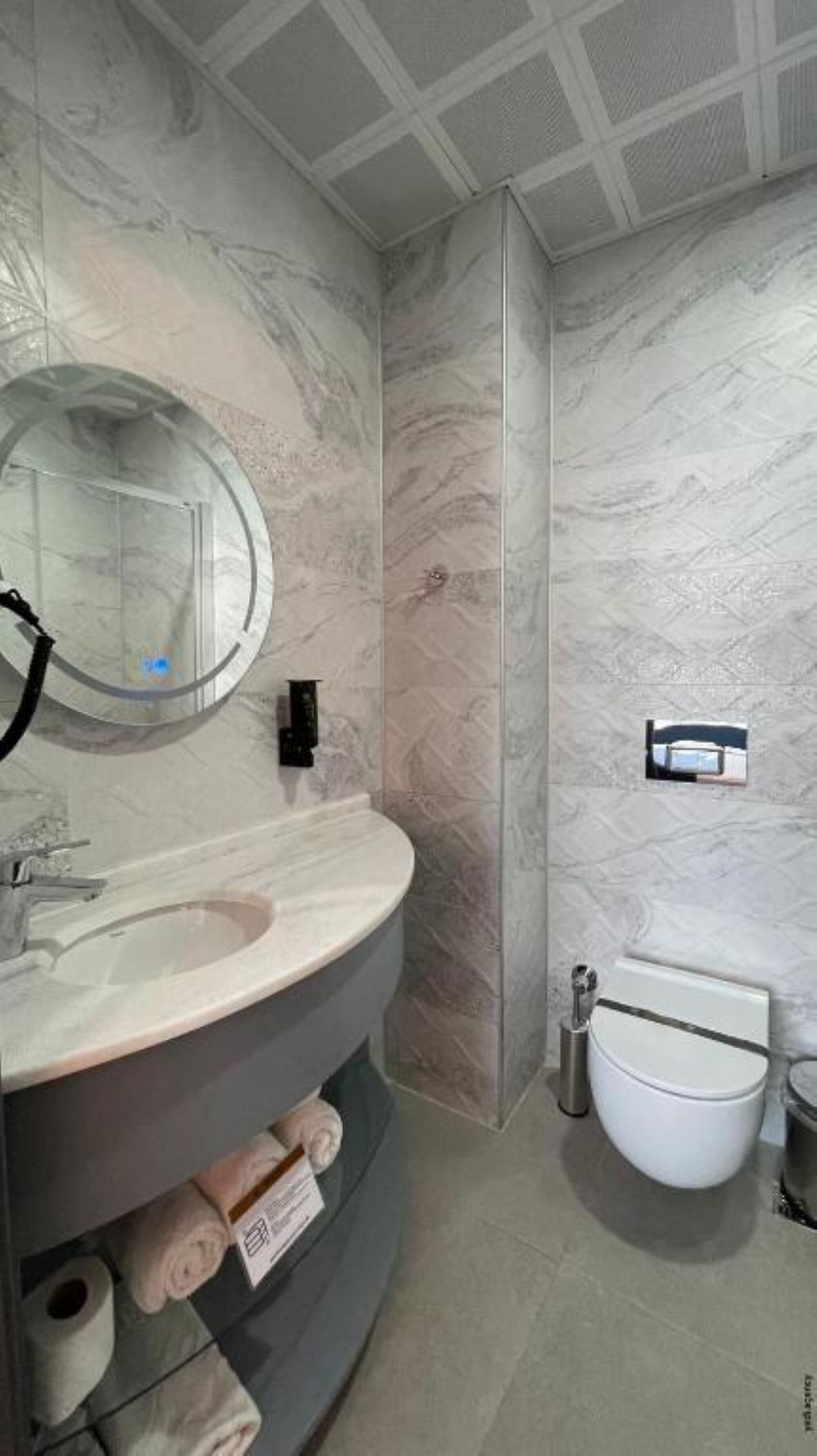 premium room, city view | bathroom | shower, rainfall showerhead, hair dryer, slippers