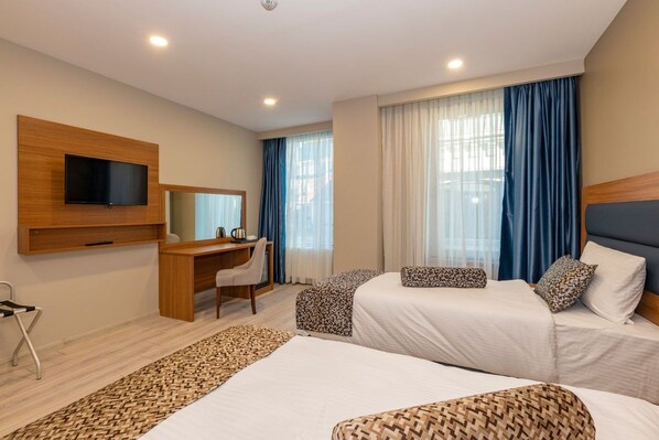 Habitación Deluxe | Sábanas italianas Frette y ropa de cama de alta calidad 