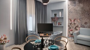 Apartemen Deluks | Area keluarga | TV layar datar