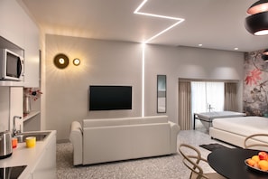 Luxury-Apartment | Wohnbereich | Flachbildfernseher