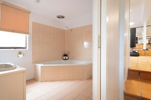 Bathtub, hair dryer, towels