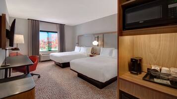 Premium bedding, desk, laptop workspace, iron/ironing board