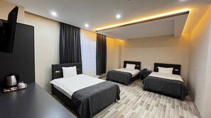 Standard Triple Room | Premium bedding, free WiFi, bed sheets - Atlihan Plus Hotel (Dogubayazit)