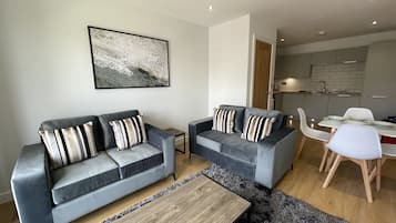 Appartement Luxe | Coin séjour | Télévision LCD de 40 pouces avec chaßnes par cùble