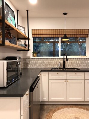 Fridge, microwave, stovetop, coffee/tea maker