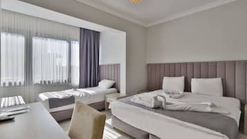 Deluxe Quadruple Room | Premium bedding, minibar, free WiFi, bed sheets