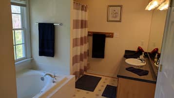 Shower, jetted tub, hair dryer, towels