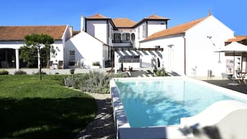 Seasonal outdoor pool, pool umbrellas, pool loungers