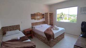 Duplex família, várias camas, vista para a praia | Individualmente decorados, individualmente mobiliados